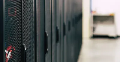 Rows of servers in a data centre, representing an AI provider's systems