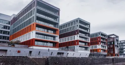 Modern multi-storey residential apartment buildings, representing the rental housing market