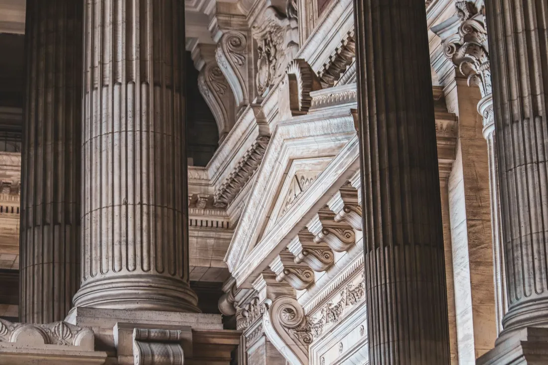 Columns of a courthouse, representing the EU General Court appeal and US intervention in the X DSA fine case