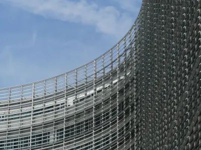 Curved facade of the European Commission's Berlaymont building in Brussels, illustrating what the EU regulations on foreign subsidies are