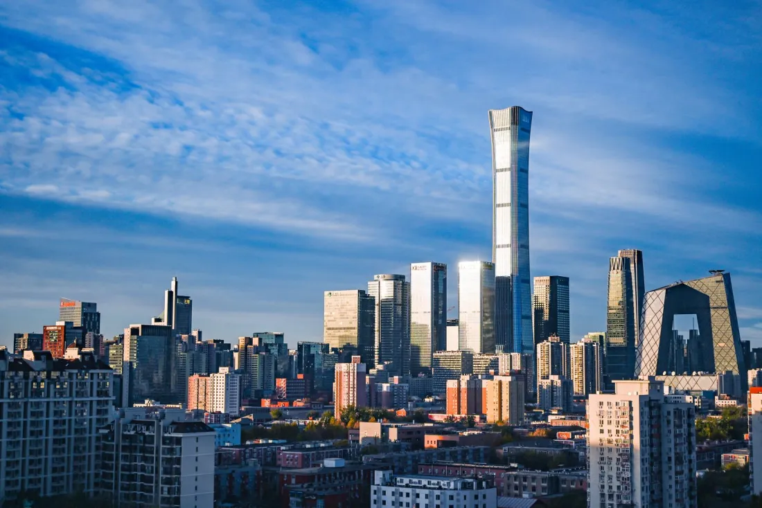 Beijing central business district skyline under a blue sky, representing China's extraterritorial jurisdiction regulation and the EU foreign subsidies regulation clash