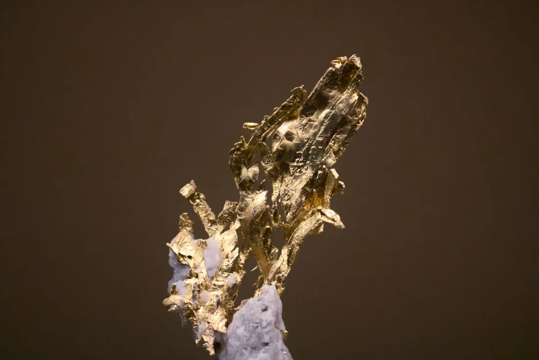 Close-up of a natural gold formation, representing gold as one of the five sectors covered by secondary sanctions on Iran