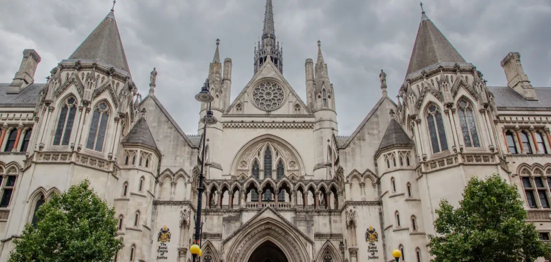 Gothic facade of the Royal Courts of Justice in London, where state immunity in arbitration enforcement has been tested in 2026