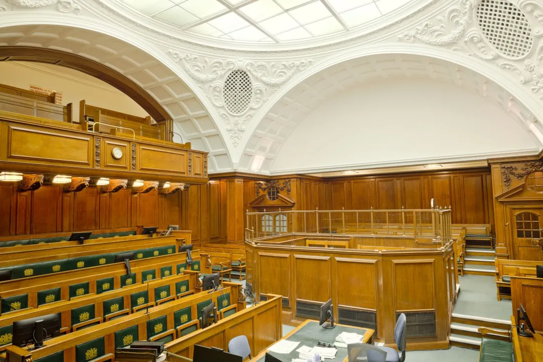 Wood-panelled historic courtroom in London, where judges decide when enforcement of a foreign arbitral award can be refused