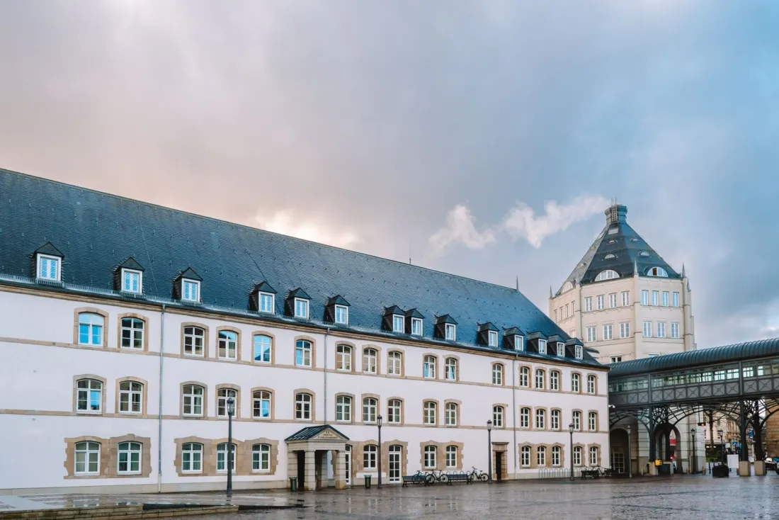 Court buildings in Luxembourg City under a cloudy sky, representing the UPC Court of Appeal and long-arm jurisdiction in UPC patent litigation