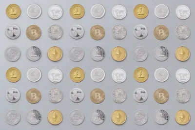 Rows of gold and silver cryptocurrency coins, illustrating whether crypto firms need FCA authorisation
