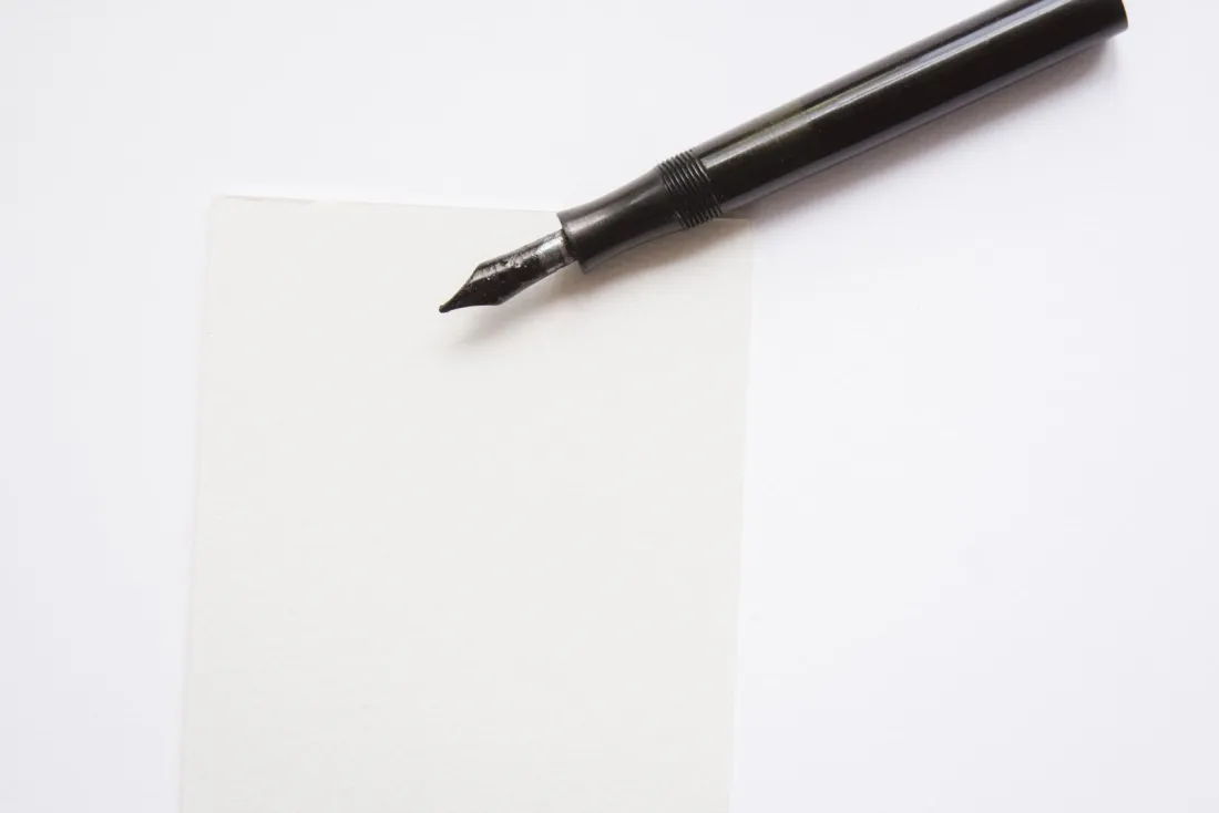 Fountain pen resting on a blank sheet, representing standard contractual clauses as a fallback if the Data Privacy Framework is no longer valid