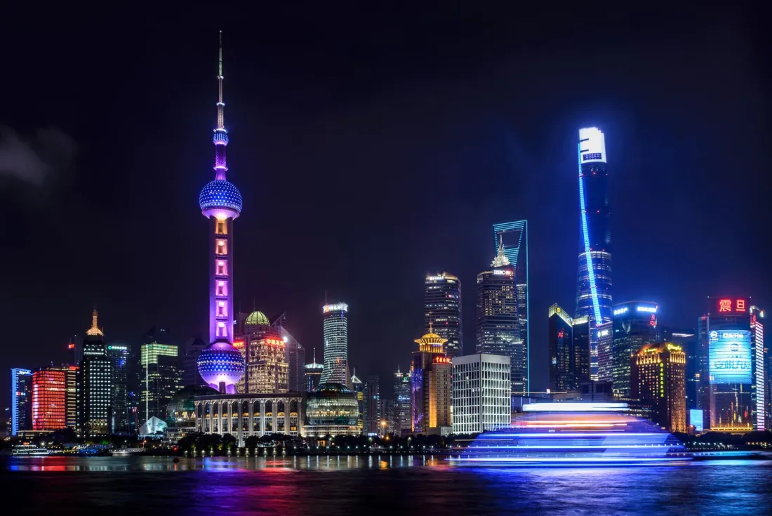 Shanghai Pudong skyline at night, illustrating China PIPL cross-border data transfer rules alongside the question of whether the Data Privacy Framework is still valid
