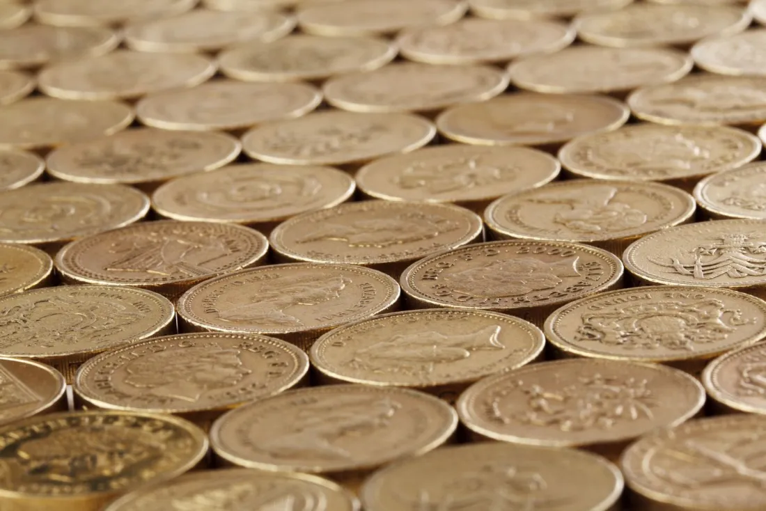 Rows of British pound coins, illustrating third-party litigation funding in the UK and the funder returns at stake in class actions