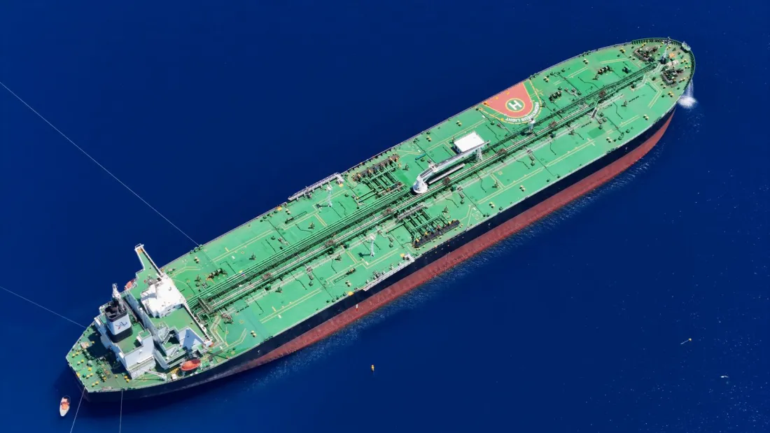 Aerial view of a very large crude carrier at anchor, the kind of tanker facing Strait of Hormuz war risk premiums