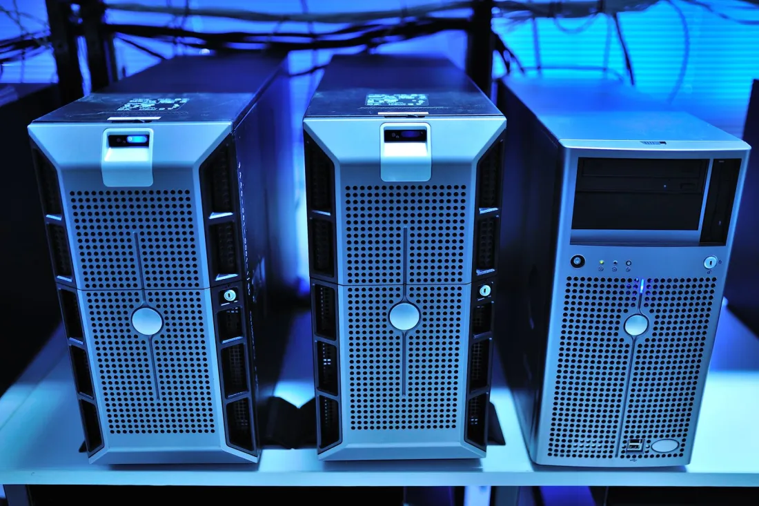 Row of tower servers under blue light, representing the Prebid integrations required by the Google ad tech antitrust remedies ruling