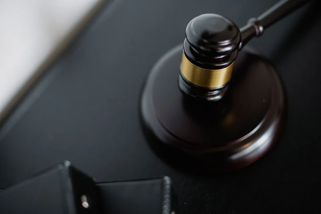 Wooden judge's gavel on a dark desk, representing the final judgment and appeal in the Google ad tech antitrust remedies ruling