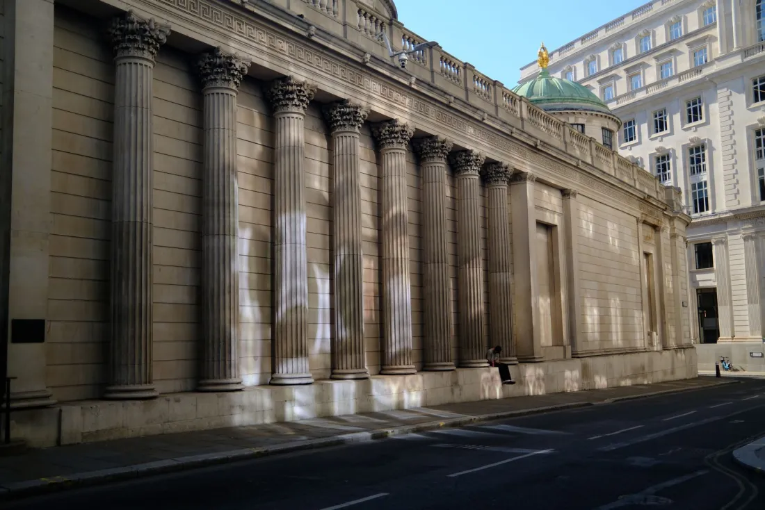 Neoclassical columns along a City of London street, illustrating whether the Chancery Division still exists after the Business and Property Division reform