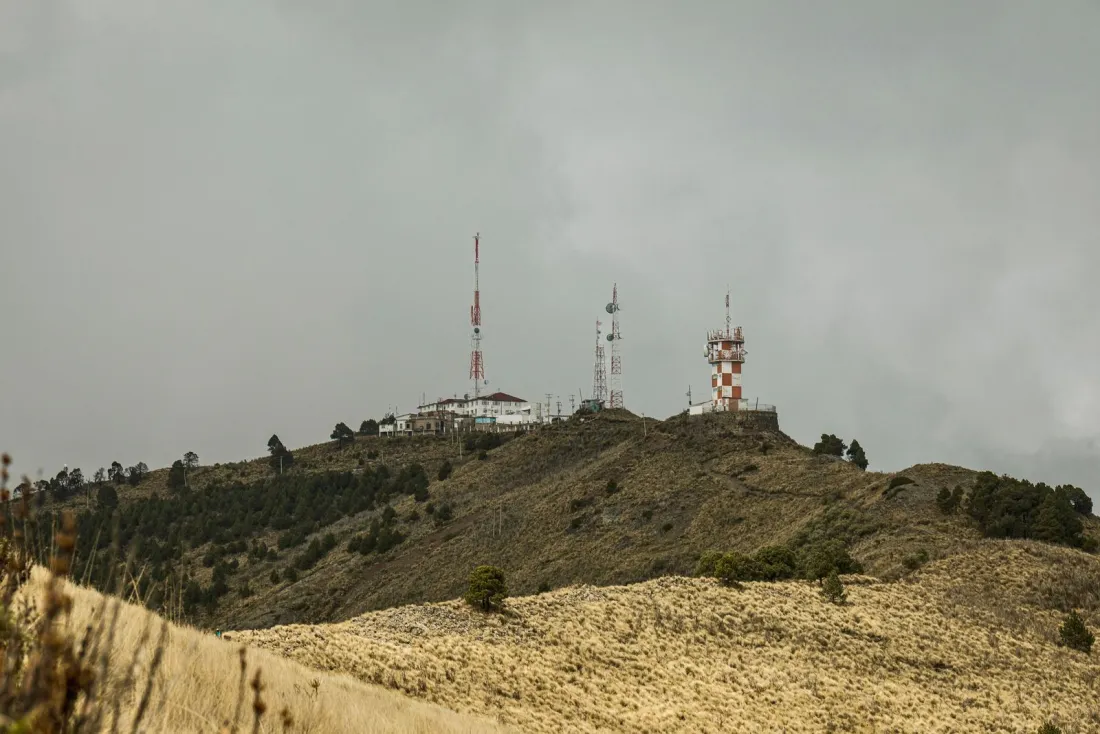 Telecoms masts on a remote hilltop, illustrating the MTN Irancell lawsuit and allegations about mobile networks in conflict regions
