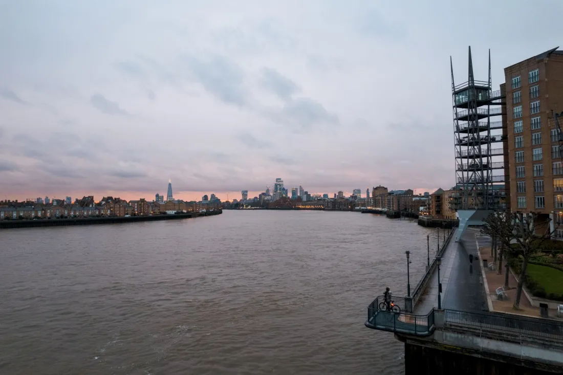 River Thames and the London skyline at dusk, illustrating Ofcom Online Safety Act enforcement against global platforms serving UK users