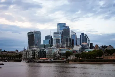 City of London skyline across the Thames at dusk, illustrating how to get a sponsor licence to hire overseas workers in the UK