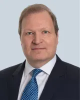 Dr. Howard E. Johnson, International Mid-Market M&A Advisory Expert in Canada, Kroll Corporate Finance Canada Limited