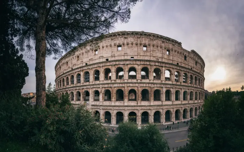 The Colosseum at sunset, Rome, Italy: lawyers and advisers in Italy