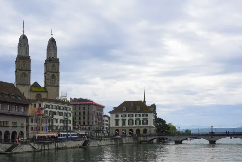 Grossmünster and the Limmat River, Zurich, Switzerland: lawyers and advisers in Switzerland