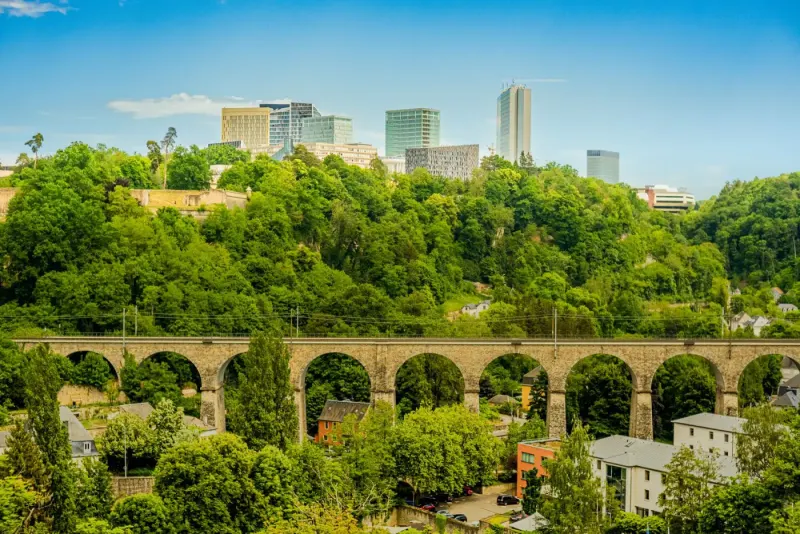 Luxembourg City: historic stone viaduct below the Kirchberg business district skyline: lawyers and advisers in Luxembourg