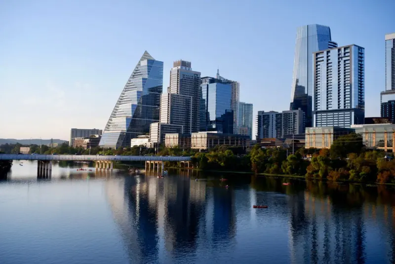 Downtown Austin skyline reflected in Lady Bird Lake, Texas: energy, environment & resources lawyers in Texas