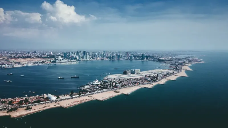 Aerial view of Luanda's bay, Ilha peninsula and city skyline, Angola: lawyers and advisers in Angola