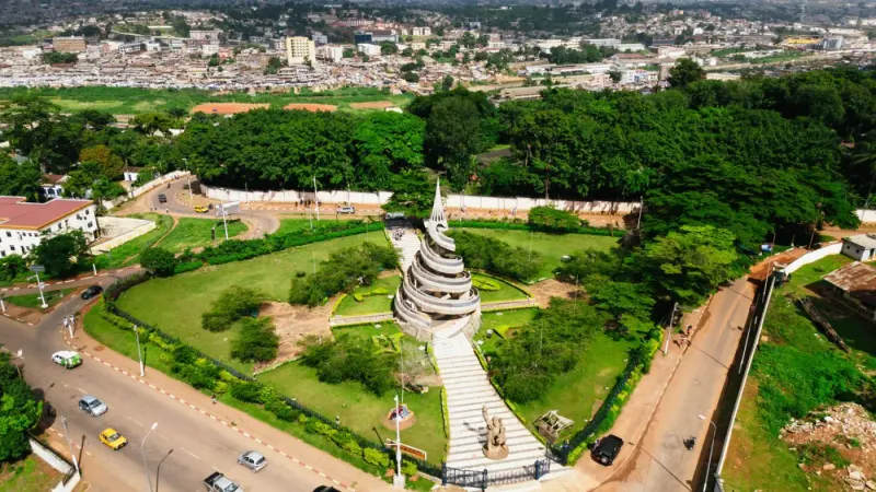 Aerial view of the Reunification Monument and surrounding gardens, Yaoundé, Cameroon: lawyers and advisers in Cameroon