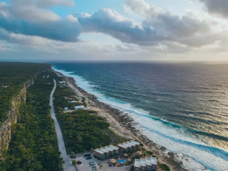 Aerial view of the cliff-backed coastline at Breakers, Cayman Islands: lawyers and advisers in the Cayman Islands
