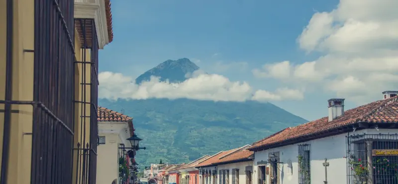 Colonial street in Antigua Guatemala with Volcán de Agua beyond: lawyers and advisers in Guatemala