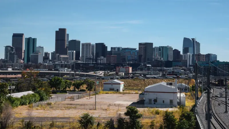 Downtown Denver skyline under a clear blue sky, Colorado: lawyers and advisers in Colorado