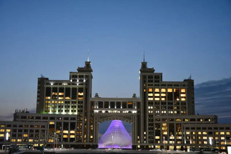 Astana architecture lit up in the evening, Kazakhstan: lawyers and advisers in Kazakhstan