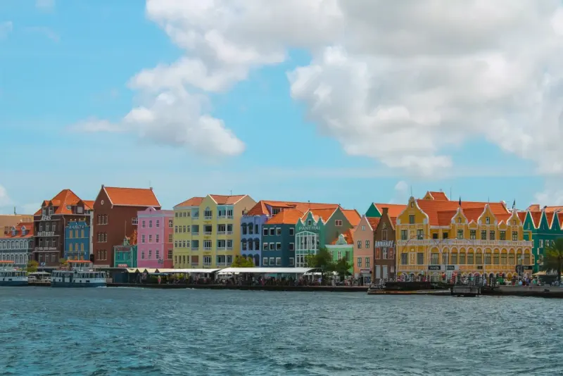 Colourful Dutch colonial facades on the Willemstad waterfront, Curaçao: lawyers and advisers in the Netherlands Antilles
