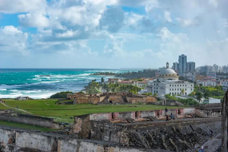 Old San Juan from the walls of El Morro fortress, with the Capitol and the Atlantic coast, Puerto Rico: lawyers and advisers in Puerto Rico