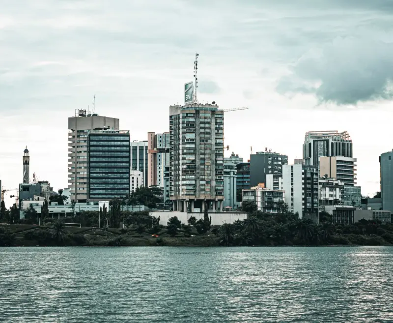 Abidjan high-rise skyline across the lagoon, Côte d'Ivoire: lawyers and advisers in Côte d'Ivoire