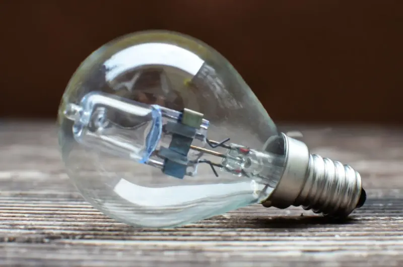 Clear light bulb lying on a wooden surface: intellectual property news and analysis