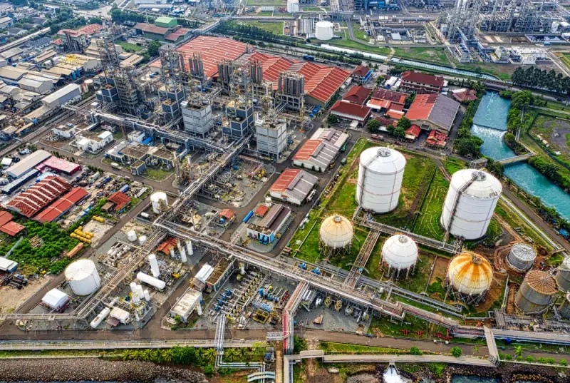 Aerial view of an industrial facility with storage tanks in Banten, Indonesia: industry experts and advisers
