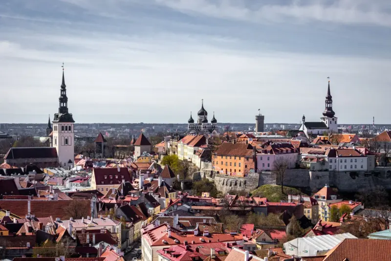 Rooftops and church spires of Tallinn Old Town, Estonia: lawyers and advisers in Estonia