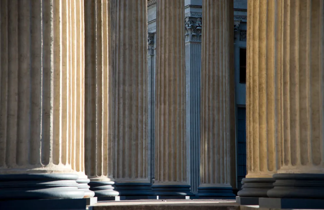 Classical stone columns of a public building, representing family office regulation and the SEC family office rule