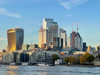 City of London office towers beside the Thames, illustrating how to buy a commercial property in the UK as a foreign company