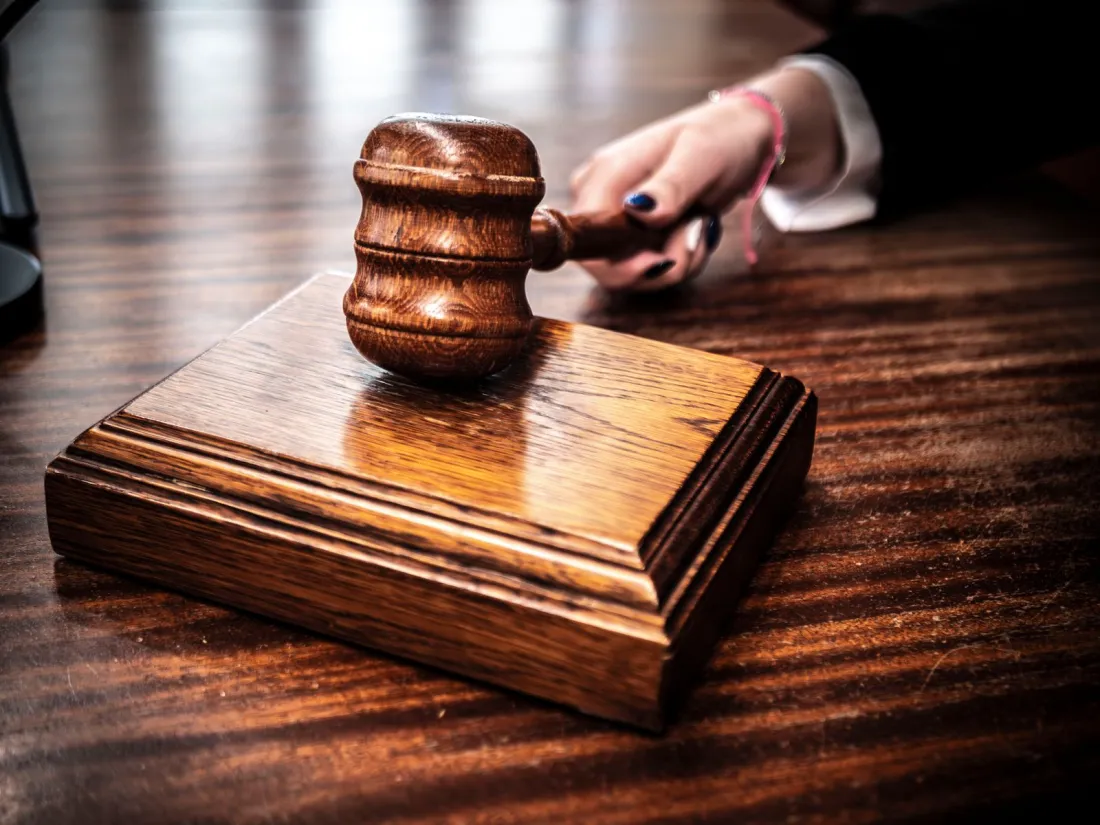 Wooden gavel on a sounding block, illustrating the court battles in the Kalshi Utah lawsuit