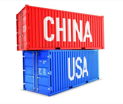 Stacked shipping containers labelled China and USA, illustrating commercial relations between the two countries
