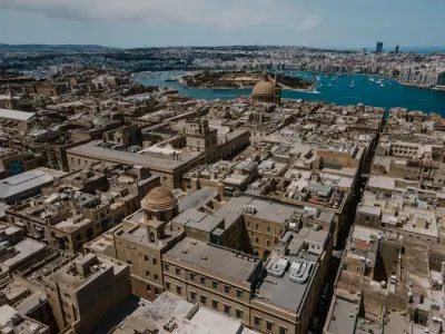 An aerial view of Valletta's harbour and historic rooftops in Malta, illustrating capital raising for SMEs
