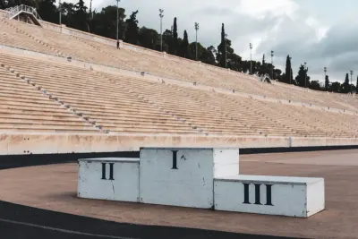 Empty first, second and third place podium in a stadium, evoking the pitfalls of forced rankings