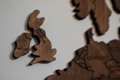 A wooden jigsaw map showing the United Kingdom, Ireland and Germany, illustrating where Brits might put down roots post-Brexit