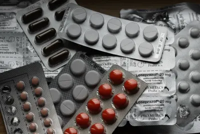 Assorted tablets in foil blister packs, illustrating a review of second medical use patents
