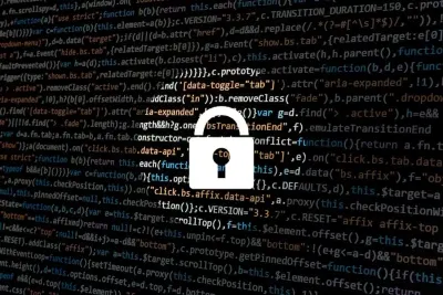A padlock icon overlaid on lines of computer code, illustrating growing fraud threats