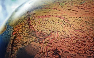 Close-up of a globe showing China and neighbouring Asian countries, illustrating China's common prosperity policy